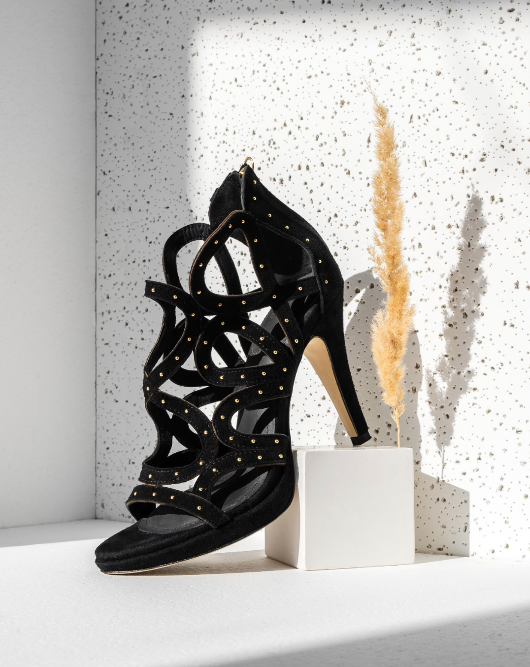 Black heels with gold top studs